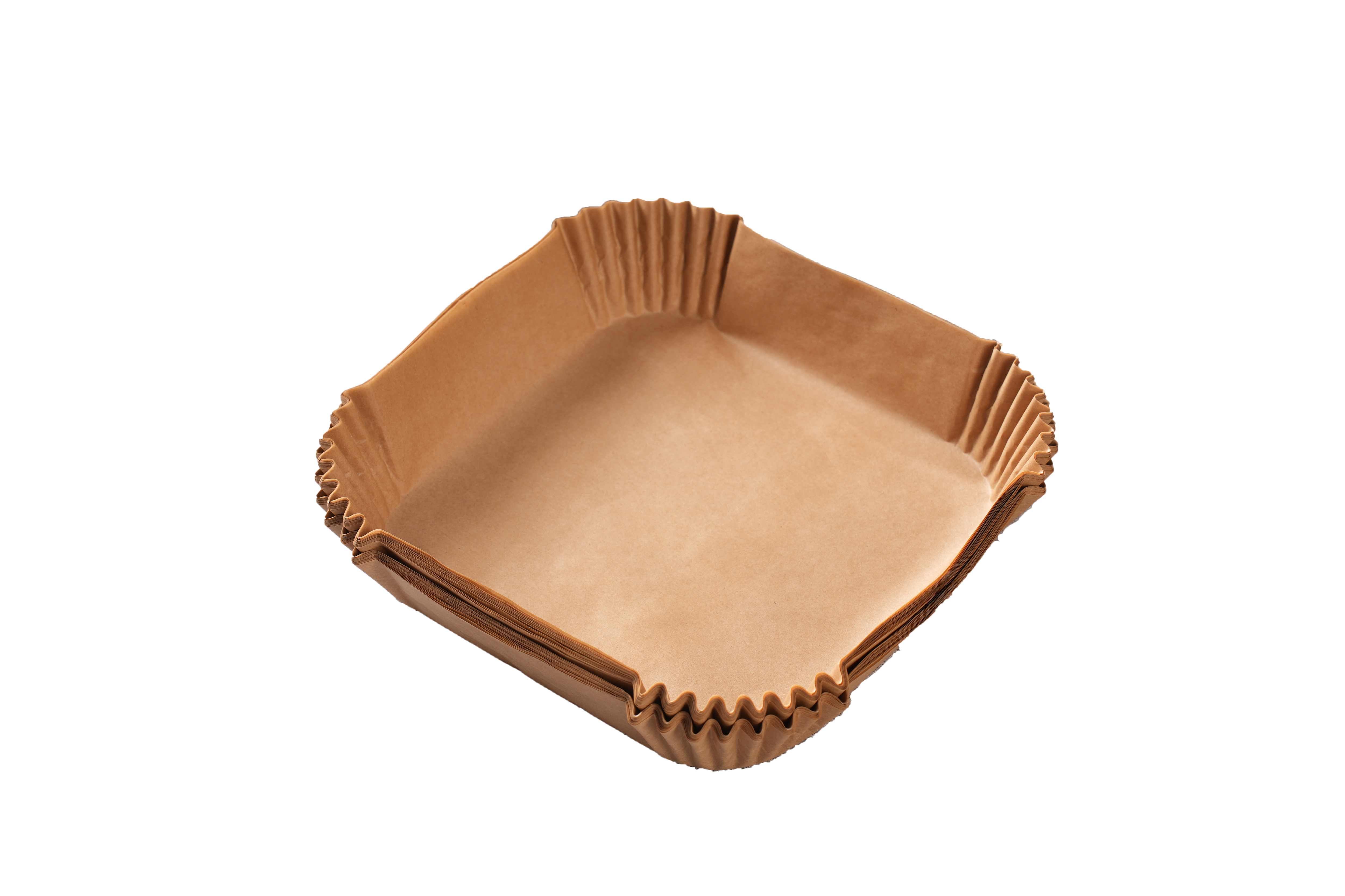 Brązowe papierowe tacki do pieczenia ułożone na czarnym tle.