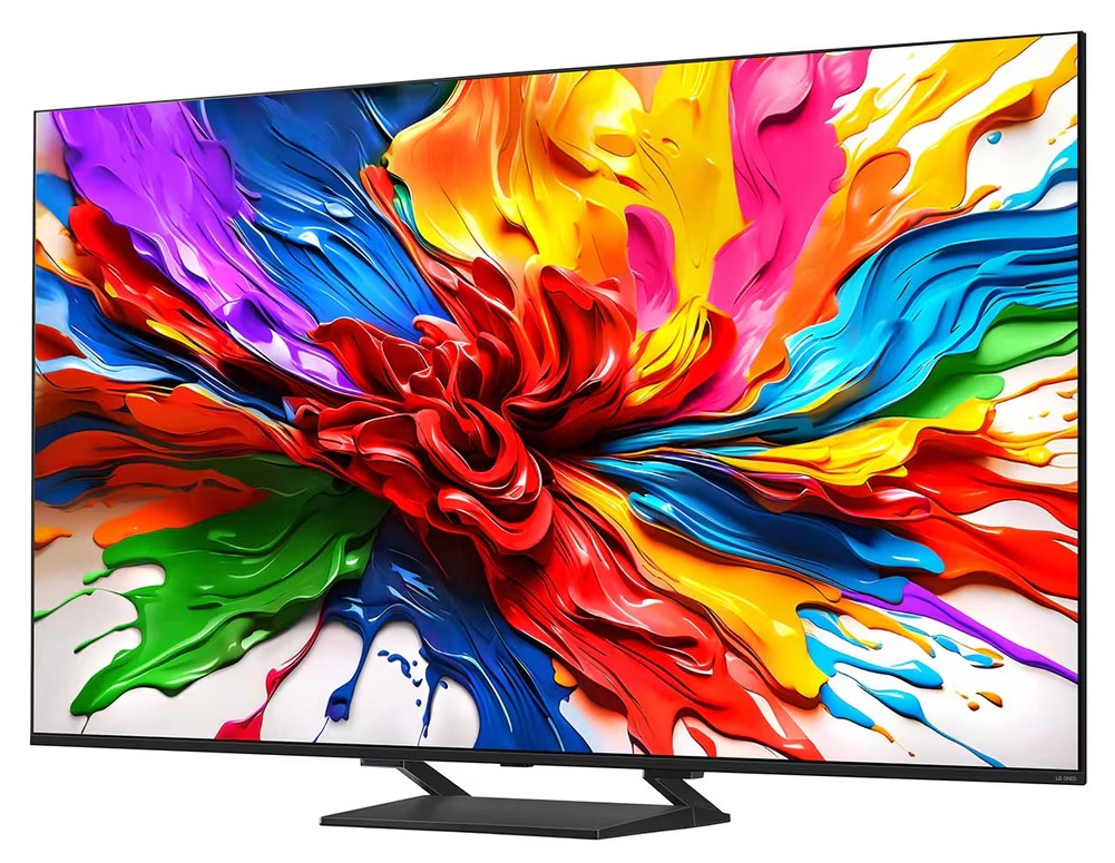 Telewizor wyświetlający kolorową sztukę abstrakcyjną. Czarny stojak. Białe tło.