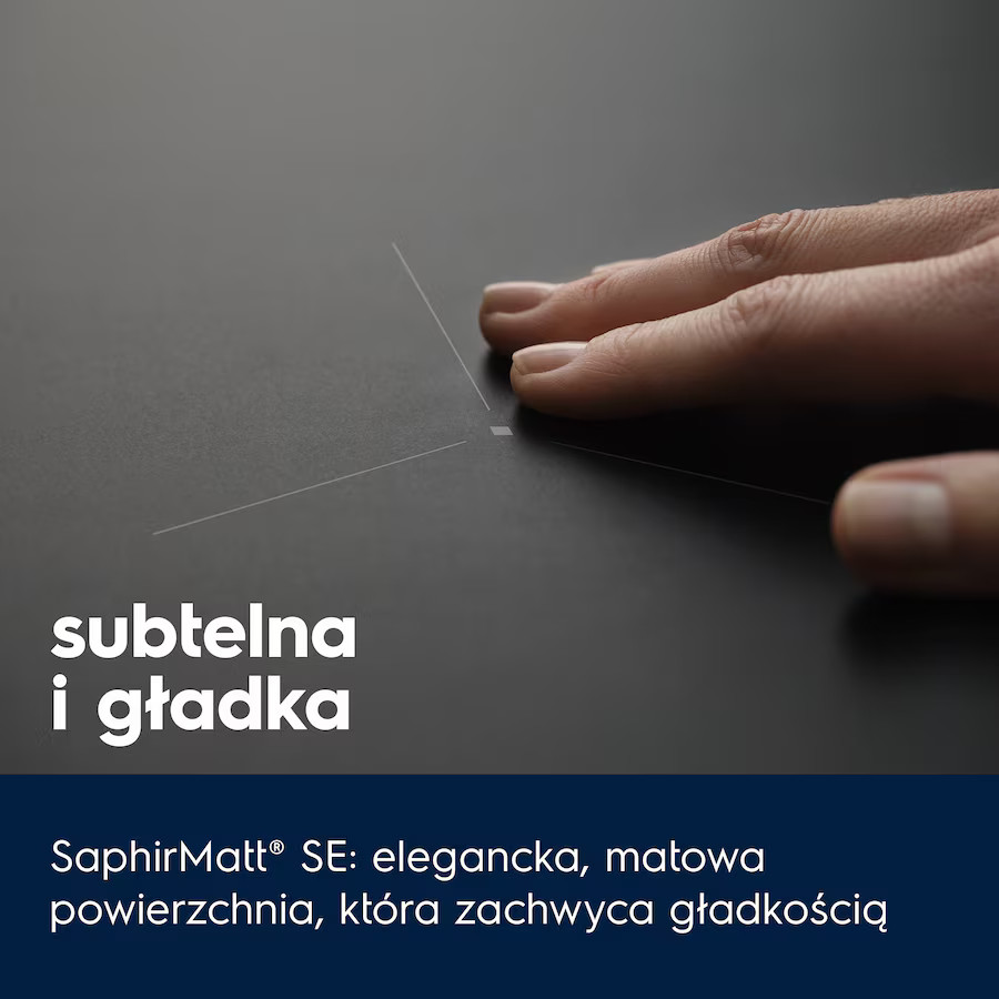 Dłoń dotykająca czarnej powierzchni płyty. Tekst: 