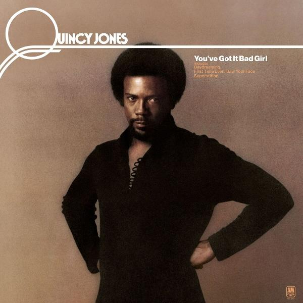 Pochette d'album de Quincy Jones : Homme avec afro, chemise noire, fond beige, titres des chansons.
