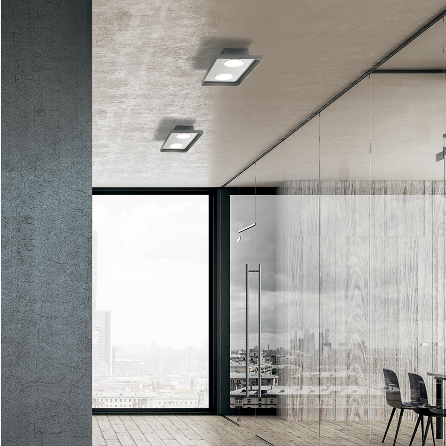 Interno con due luci a soffitto. Vista attraverso porte a vetri su un paesaggio urbano.
