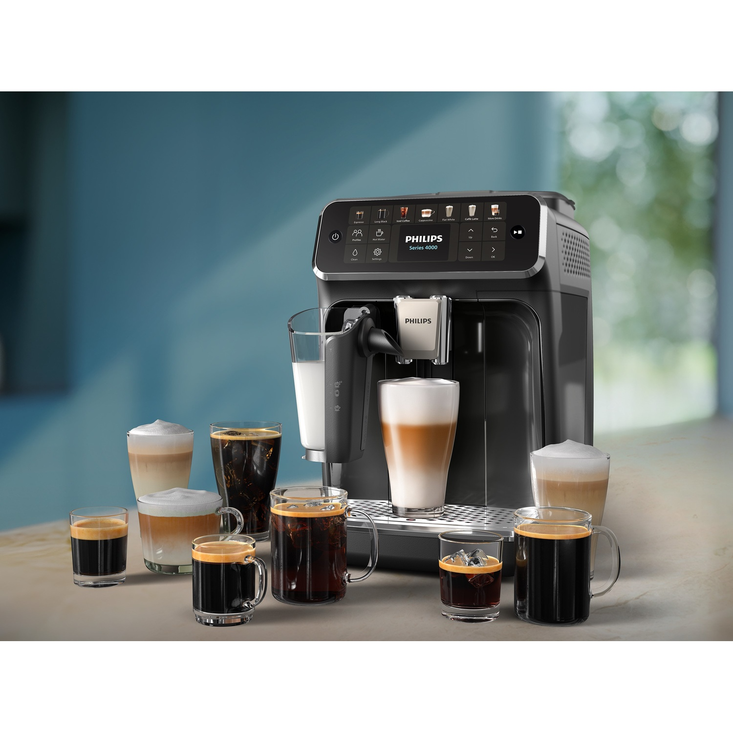 Una macchina da caffè Philips con varie bevande al caffè e un bicchiere di latte. La macchina sta preparando un latte.