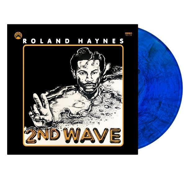 Albumcover mit Bild eines Mannes und Text '2nd Wave' und 'Roland Haynes' in Schwarz und Gelb.