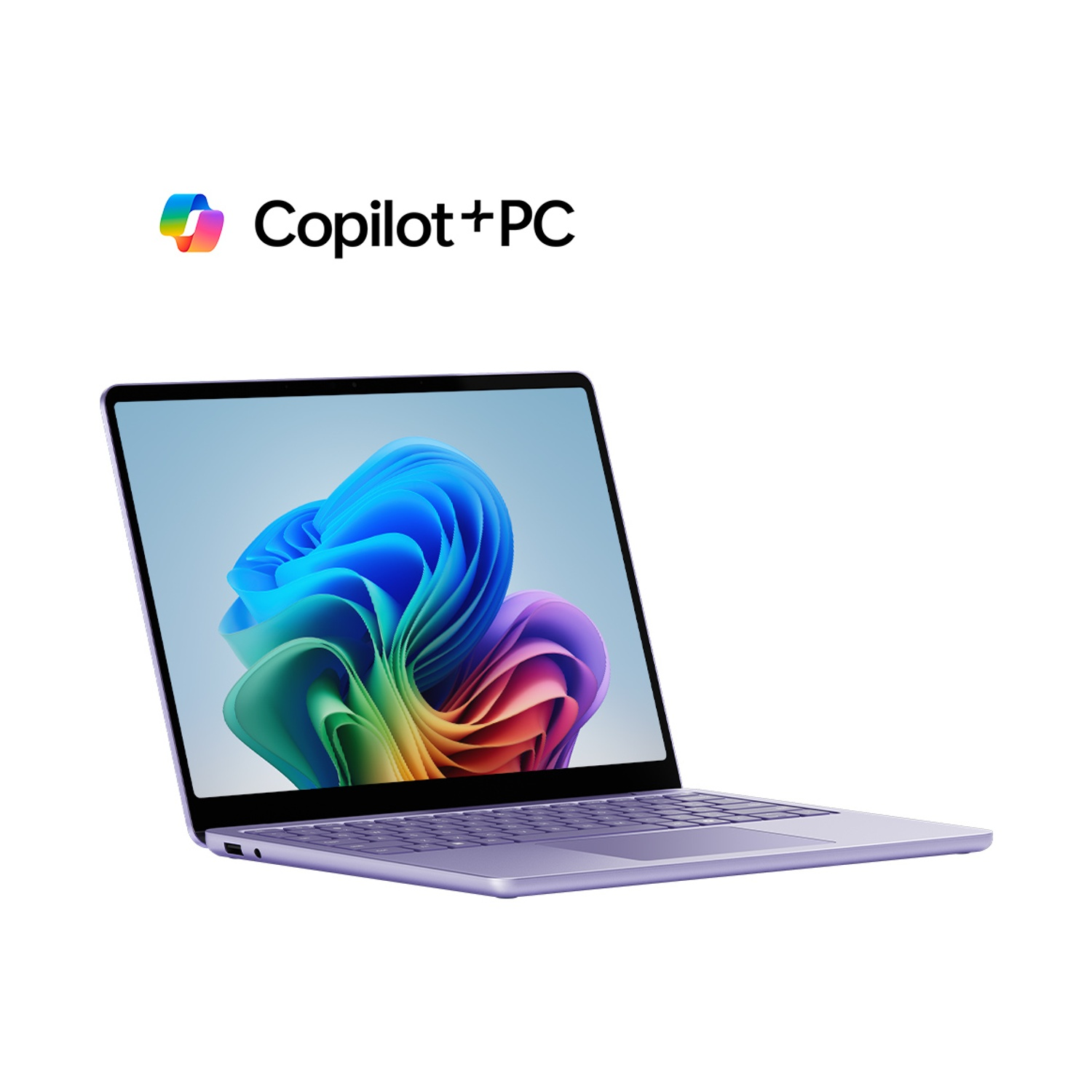 Laptop viola con logo Copilot+PC sullo schermo.