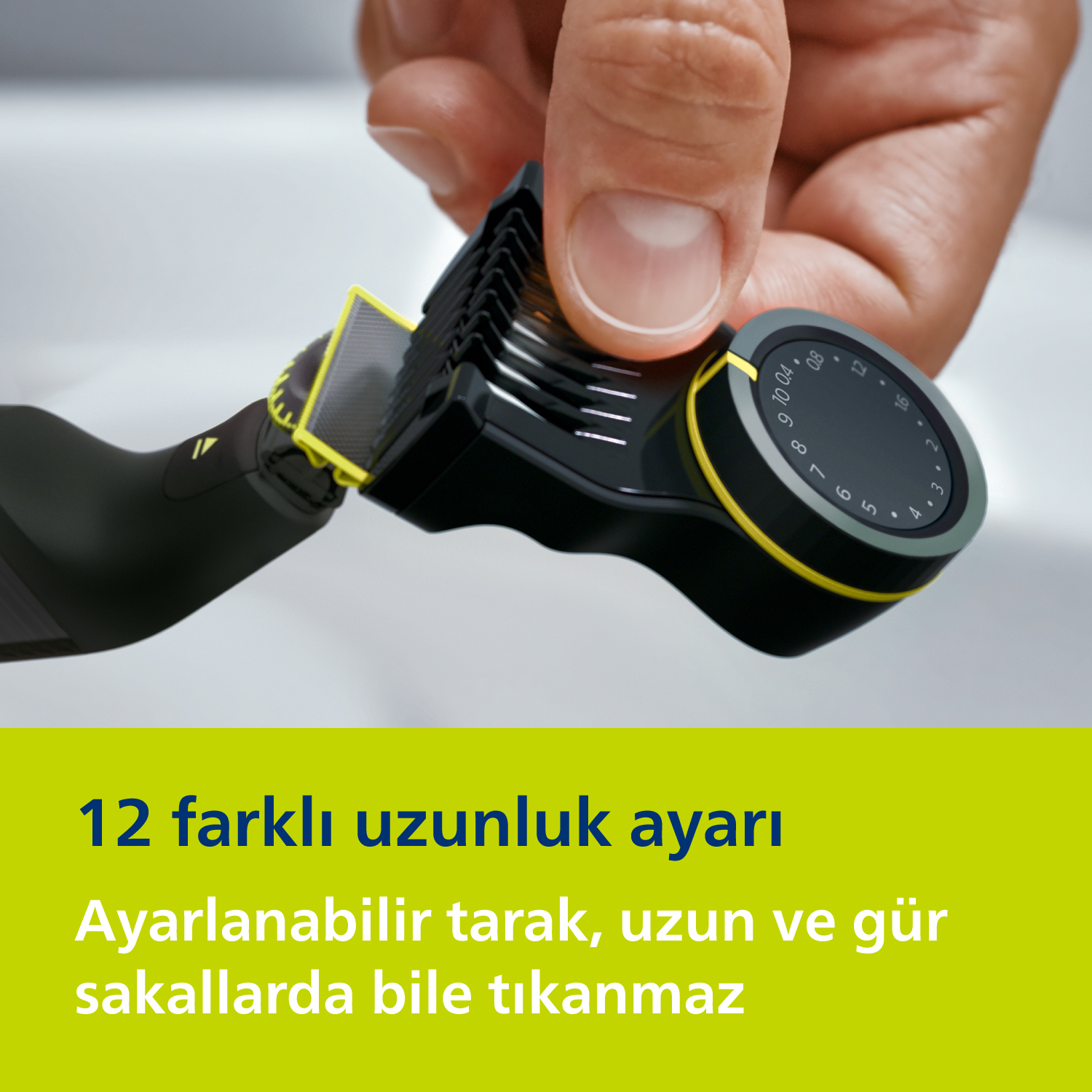 El, Philips OneBlade Pro'yu ayarlıyor, uzunluk ayarlarını gösteriyor.