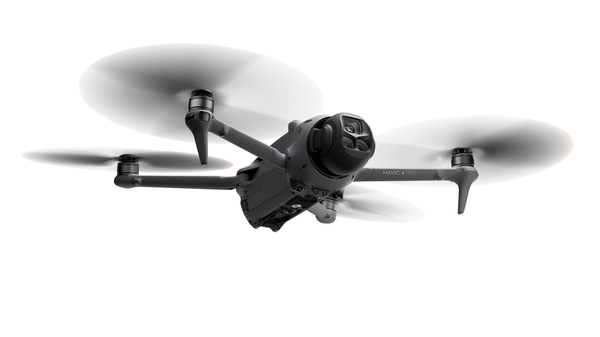 Yukarıdan görünen, pervaneleri uzatılmış ve kameraları görünen gri bir drone.