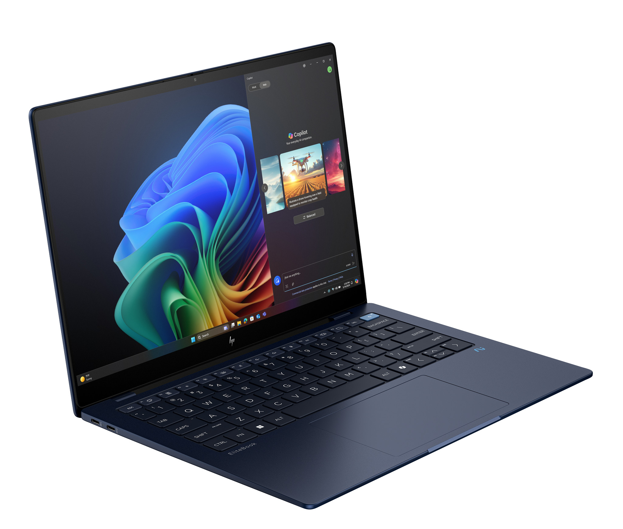 Laptop offen, zeigt Copilot auf dem Bildschirm. Dunkelblauer Laptop, weißer Hintergrund.
