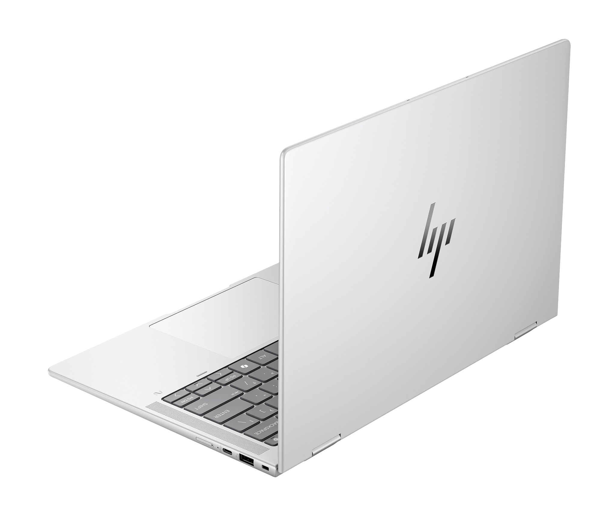 Silberner Laptop-Seitenansicht, Anschlüsse sichtbar, weißer Hintergrund.