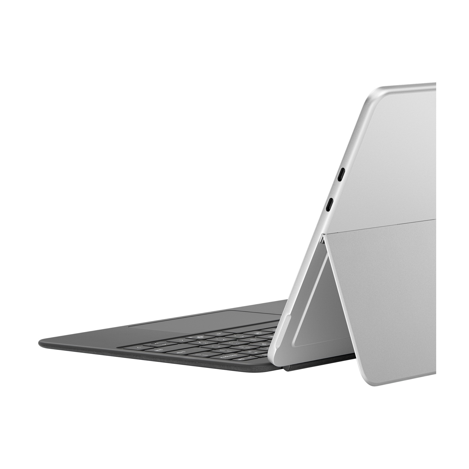 Tablet argento con tastiera, vista laterale. La tastiera è collegata e leggermente aperta.