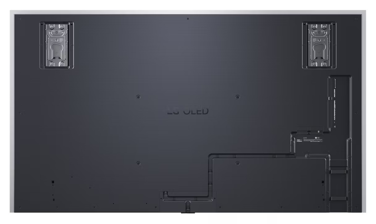 Widok z tyłu dużego czarnego telewizora OLED z metalowymi mocowaniami.
