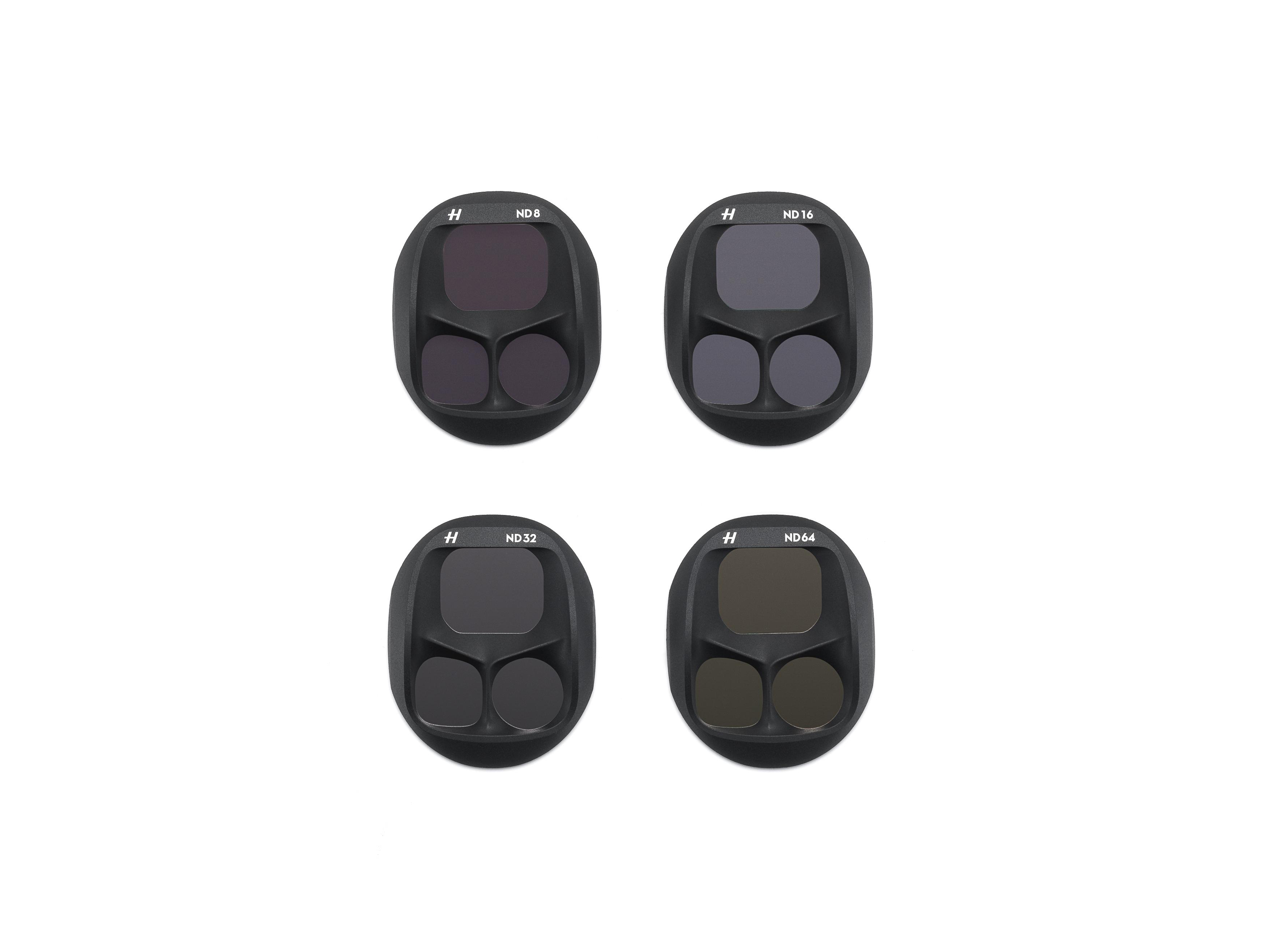 Vier Kamerafilter mit der Aufschrift ND8, ND16, ND32 und ND64. Die Filter sind schwarz mit farbigen Elementen.