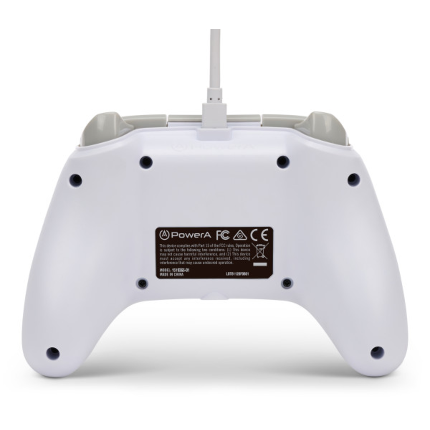Back of a white Xbox controller with a cable port, and text on a black label.