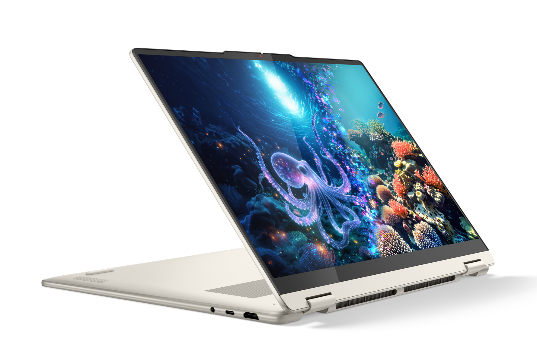 Laptop z ekranem przedstawiającym podwodną scenę z ośmiornicą i rafami koralowymi.