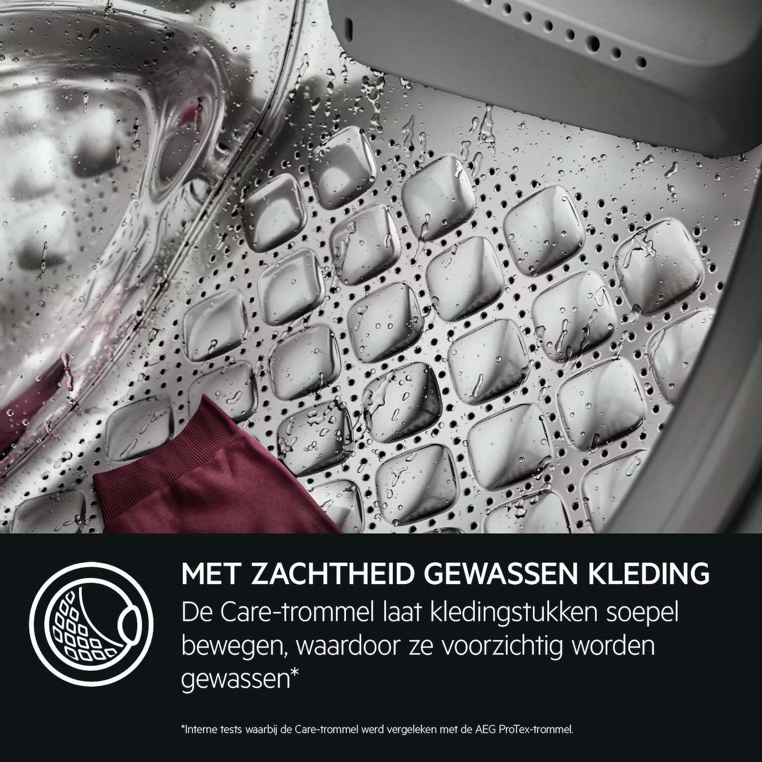 Washing machine drum with a burgundy garment.  Icon showing a soft wash.