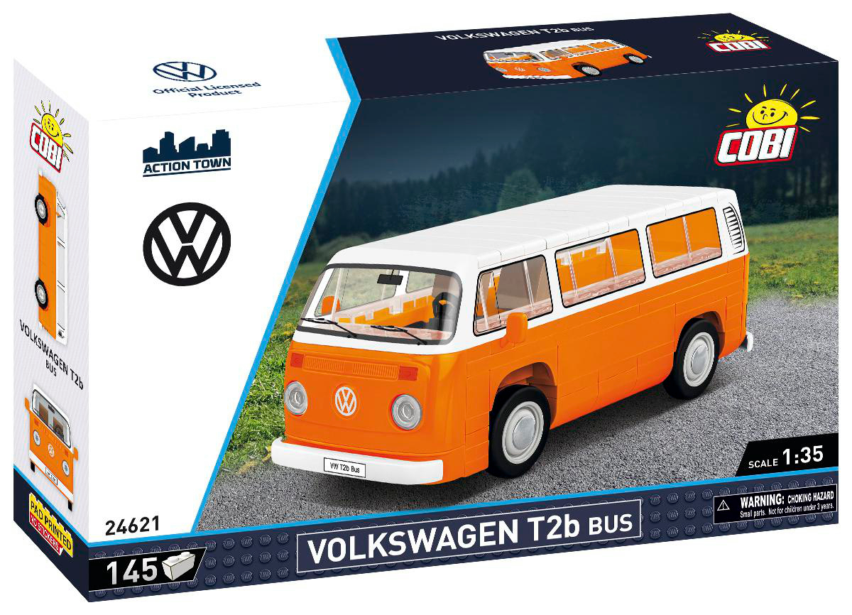 Orange-weißer VW T2b Bus Spielzeug in einer Box. Die Box zeigt den Bus und das VW-Logo.