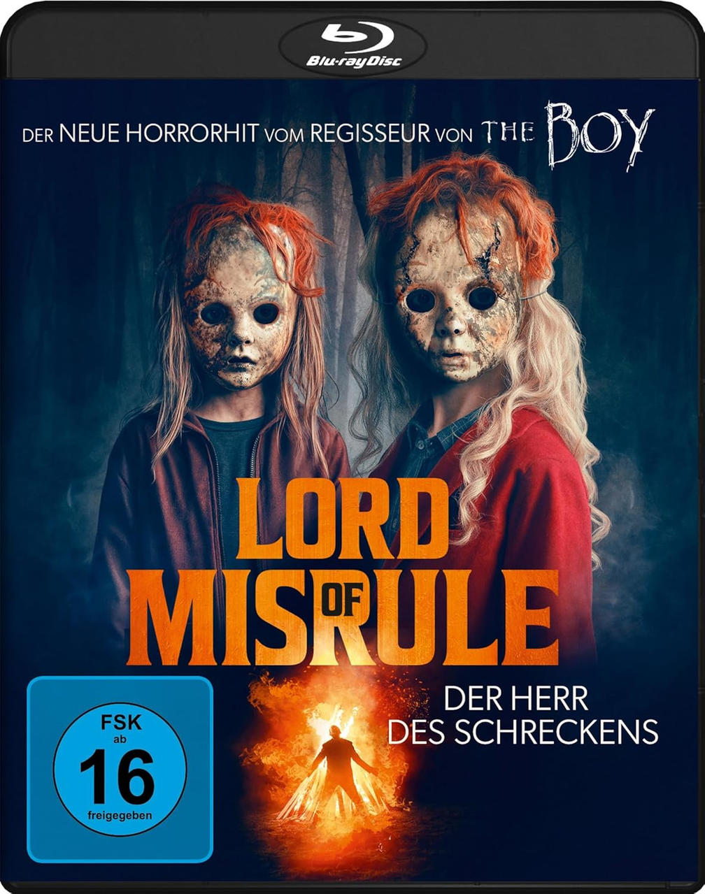 DVD-Hülle für 'Lord of Misrule'. Zeigt zwei maskierte Figuren und den Titel in großen Buchstaben. Dunkler Hintergrund.