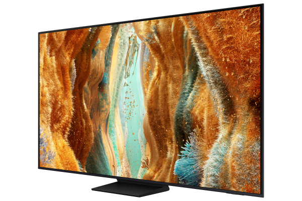 Turuncu ve mavi tonlarında renkli, soyut bir manzara gösteren büyük, siyah çerçeveli bir TV.