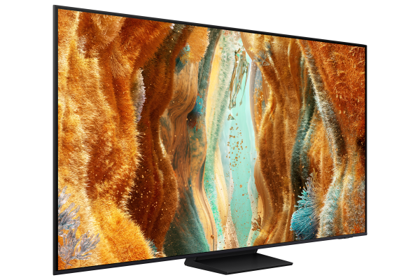Turuncu ve mavi tonlarında renkli, soyut bir manzara gösteren büyük, siyah çerçeveli bir TV.