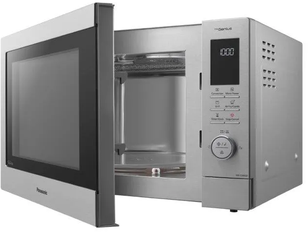 Microonde Panasonic argentato con porta aperta. L'interno e il pannello di controllo sono visibili.