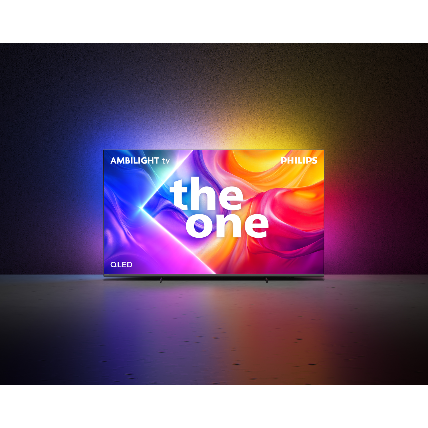 Philips TV displaying 'the one' on screen with vibrant colors, set against a dark background.
