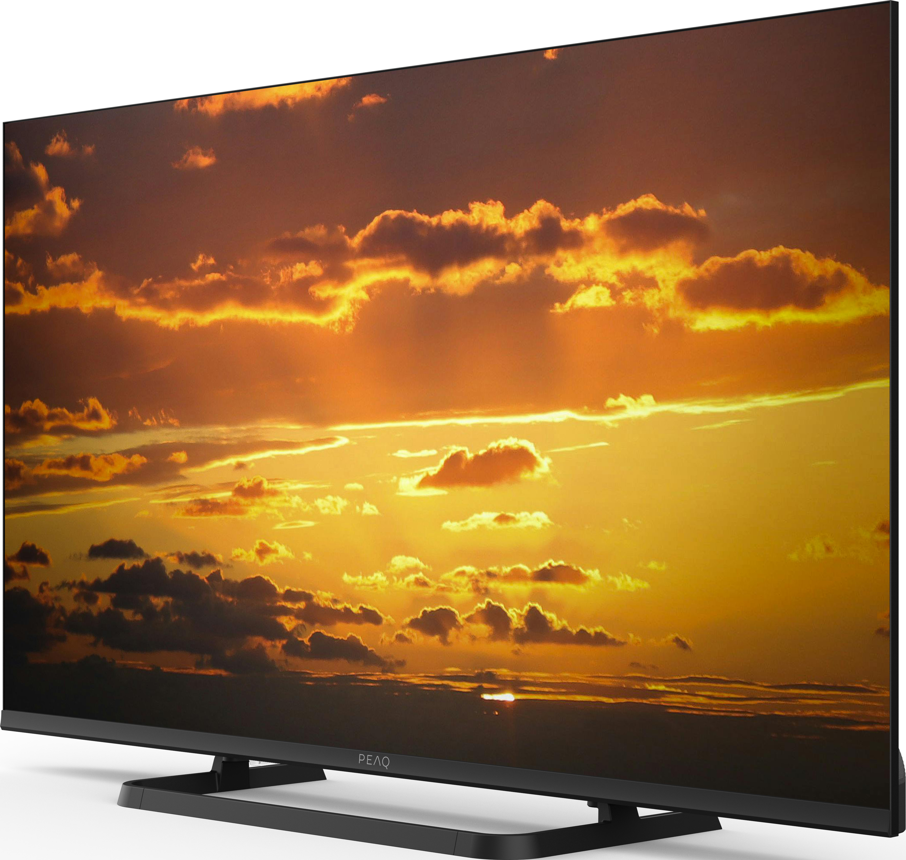 Seitenansicht eines Fernsehers mit Anschlüssen und einem schwarzen Ständer.
