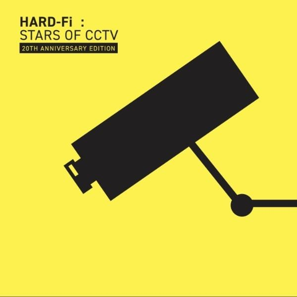 Gelbes Albumcover mit schwarzem Überwachungskamera-Icon und dem Text 'HARD-Fi'.
