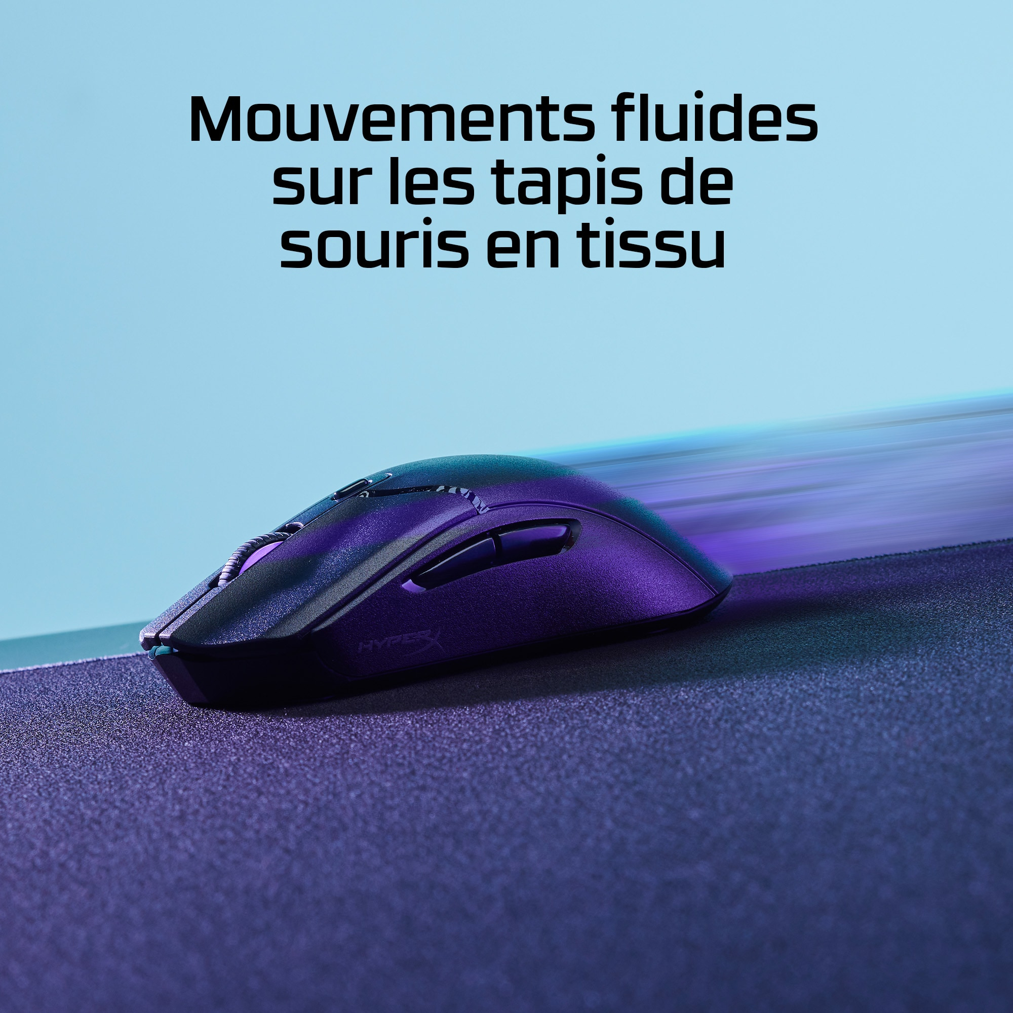 A black mouse on a purple mousepad with a blurred motion effect.