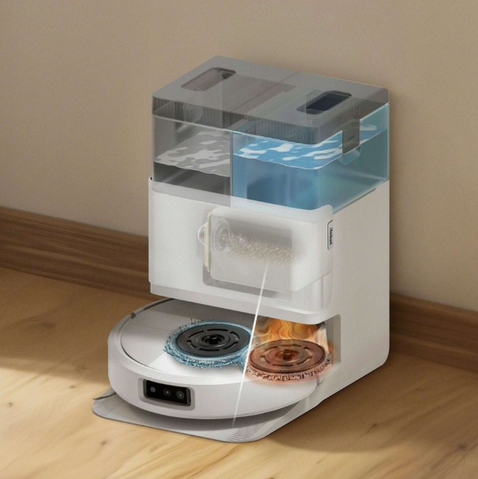 Biało-szary robot sprzątający z pojemnikiem na wodę i nakładkami czyszczącymi. Urządzenie w pomieszczeniu.