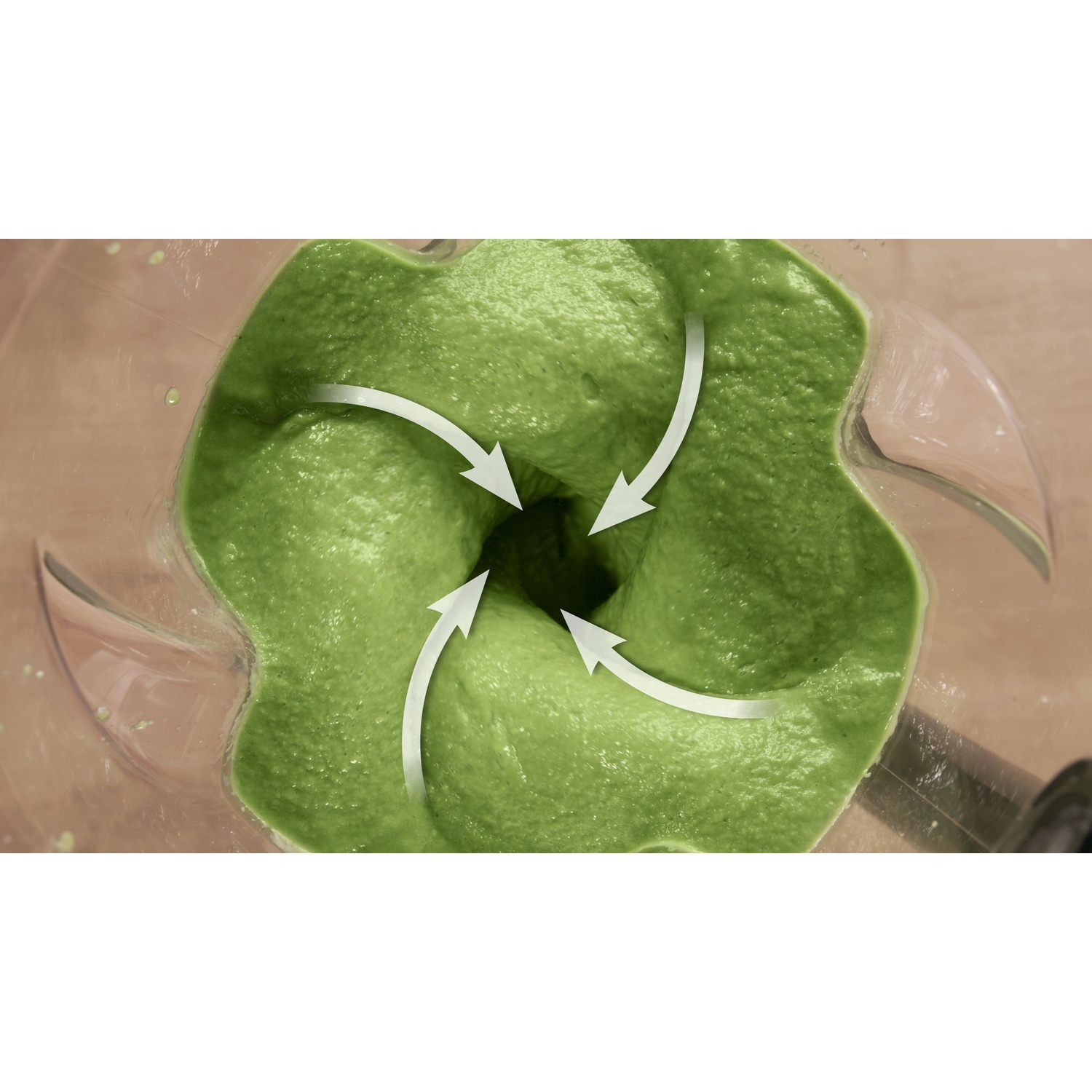 Frullato verde che ruota in un frullatore, le frecce indicano il movimento.