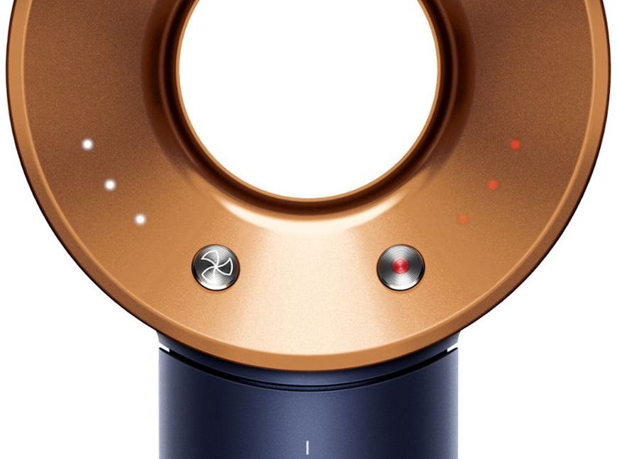 Gros plan de la tête du sèche-cheveux Dyson avec boutons et lumières. Couleur bronze.