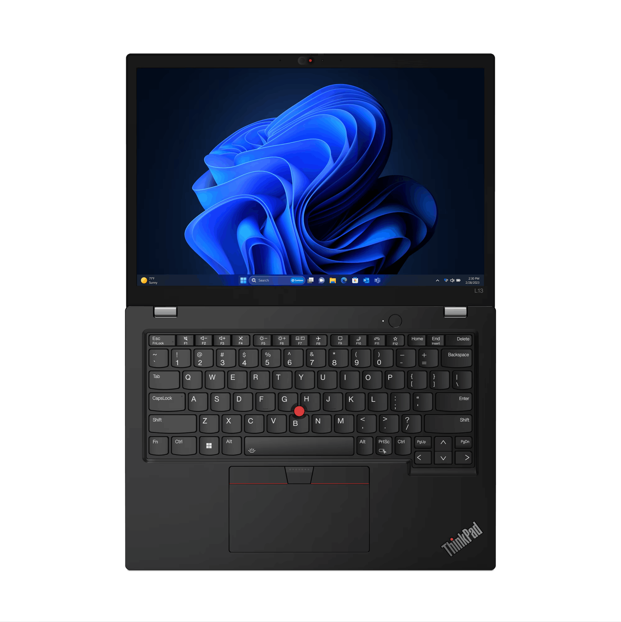 Laptop negro con una pantalla colorida que muestra un diseño abstracto azul.