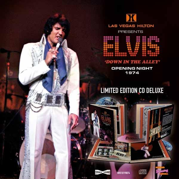 Elvis auf der Bühne mit Mikrofon. Titel: Elvis, Down in the Alley. Eröffnungsnacht 1974.