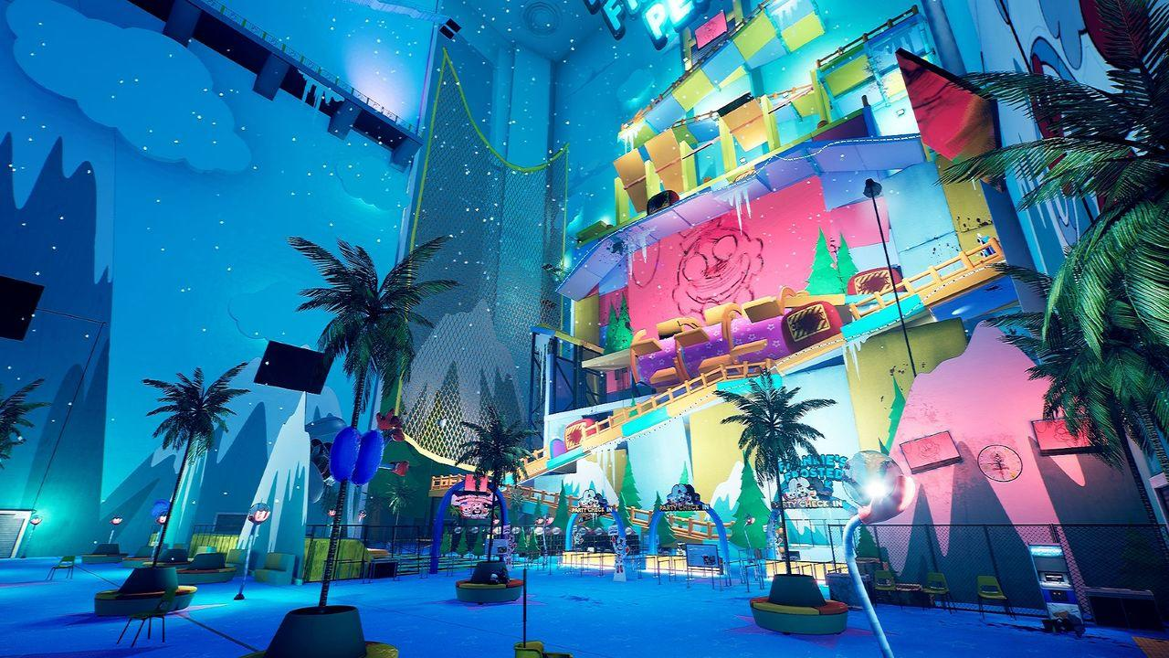 Ein lebendiger Indoor-Spielbereich mit bunten Strukturen und Palmen.