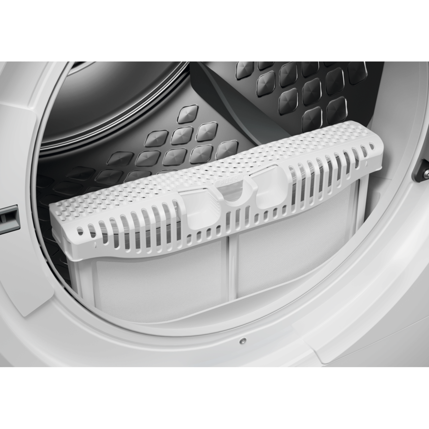 A dryer compartment with a filter. The interior is white.