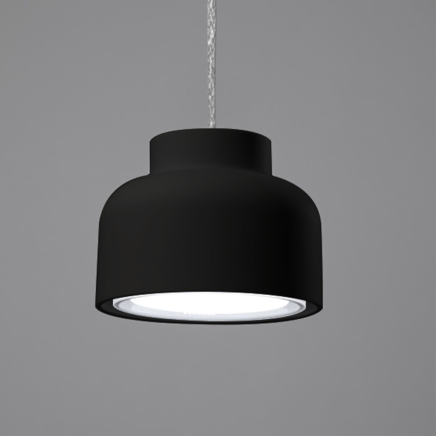 Una lampada a sospensione nera ed elegante con una base arrotondata e una sorgente luminosa circolare.