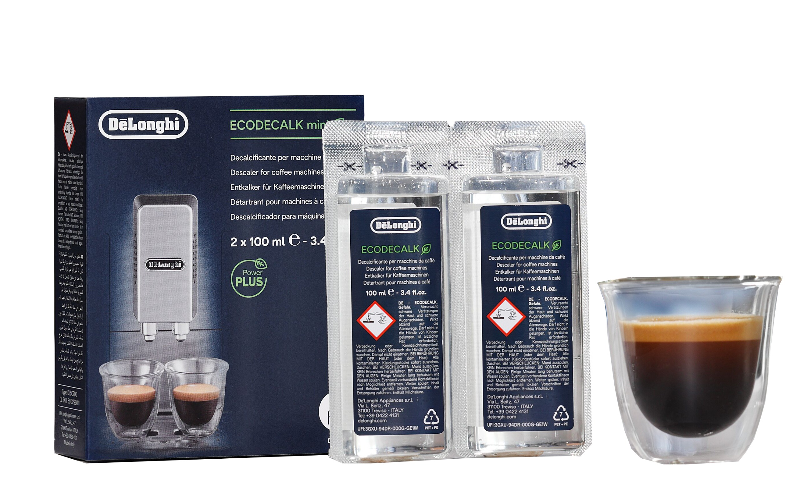 Kireç çözücü şişeler, bir kutu ve bir bardakta espresso.