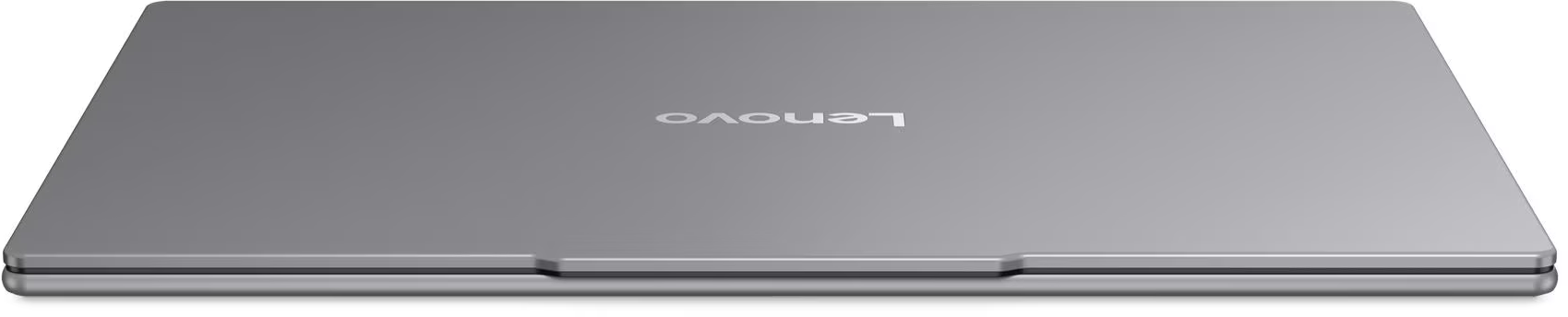 Zárt ezüst laptop fehér felületen, látható Lenovo logóval.