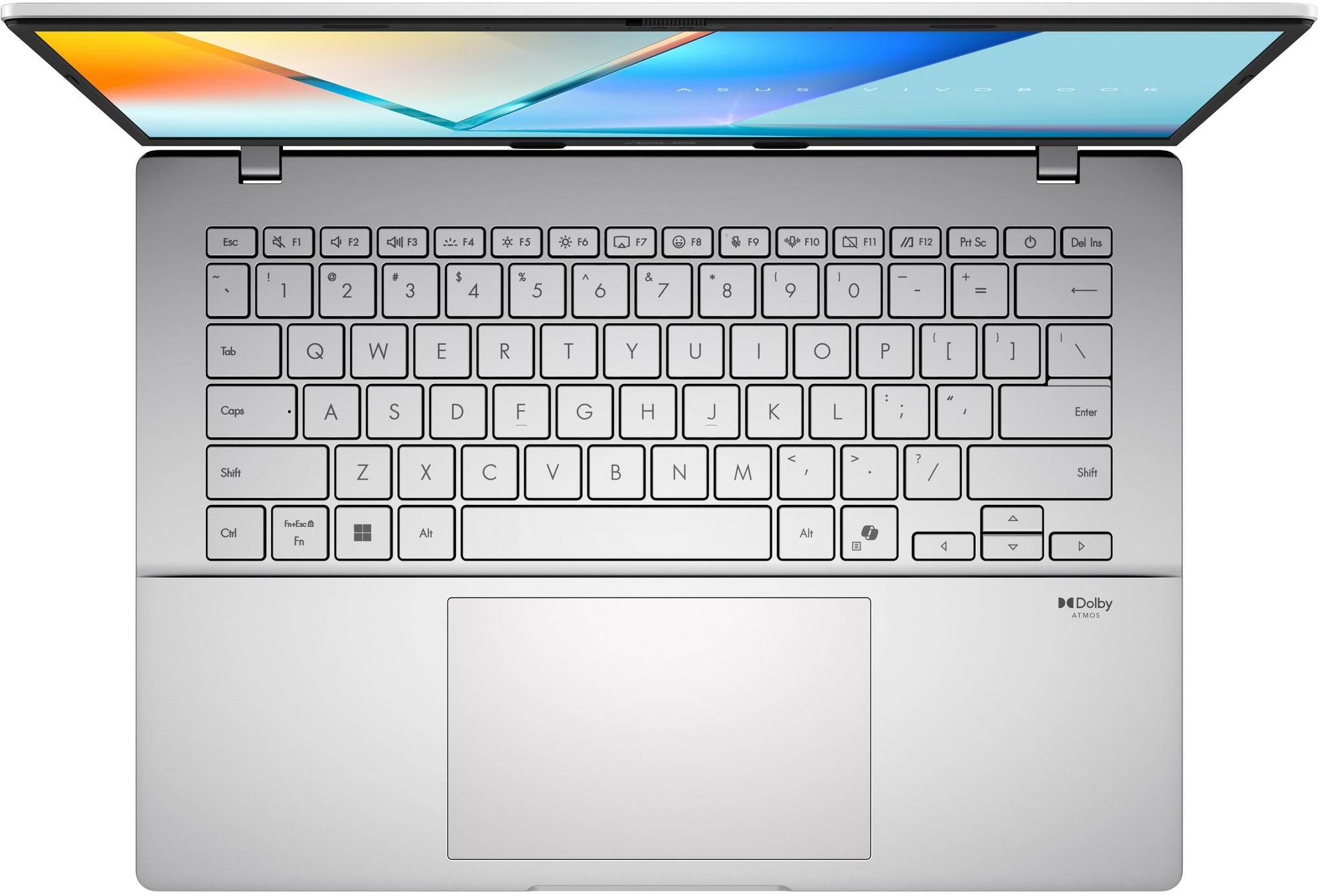 Felülnézet egy nyitott Asus Vivobook laptopról, amely a billentyűzetet, az érintőpadot és a képernyőt mutatja.