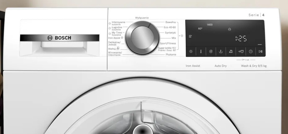 Zbliżenie panelu sterowania białej pralki z różnymi ustawieniami.