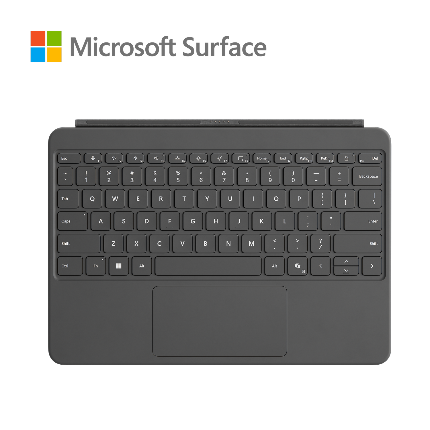 Teclado negro Microsoft Surface sobre un fondo negro.