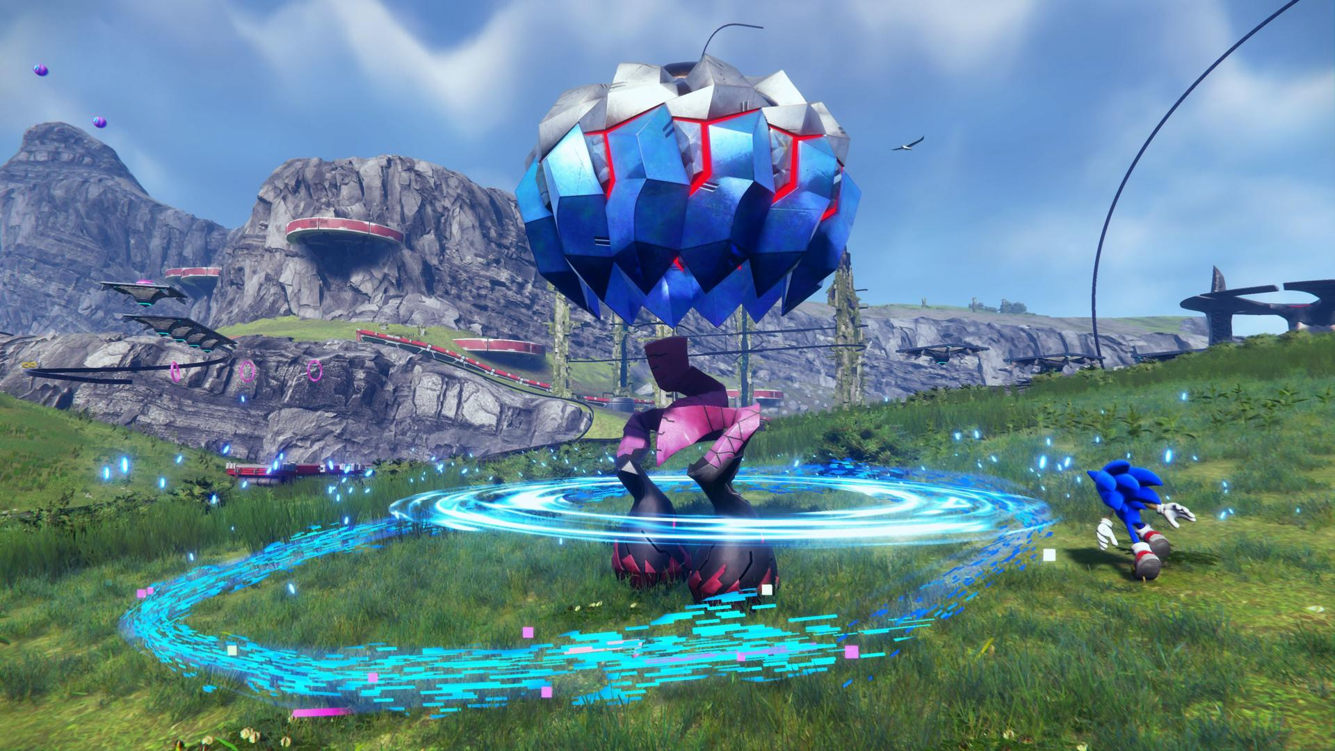 Sonic rennt auf einem Grasfeld mit blauem Lichtkreis, in einer farbenfrohen Szene.