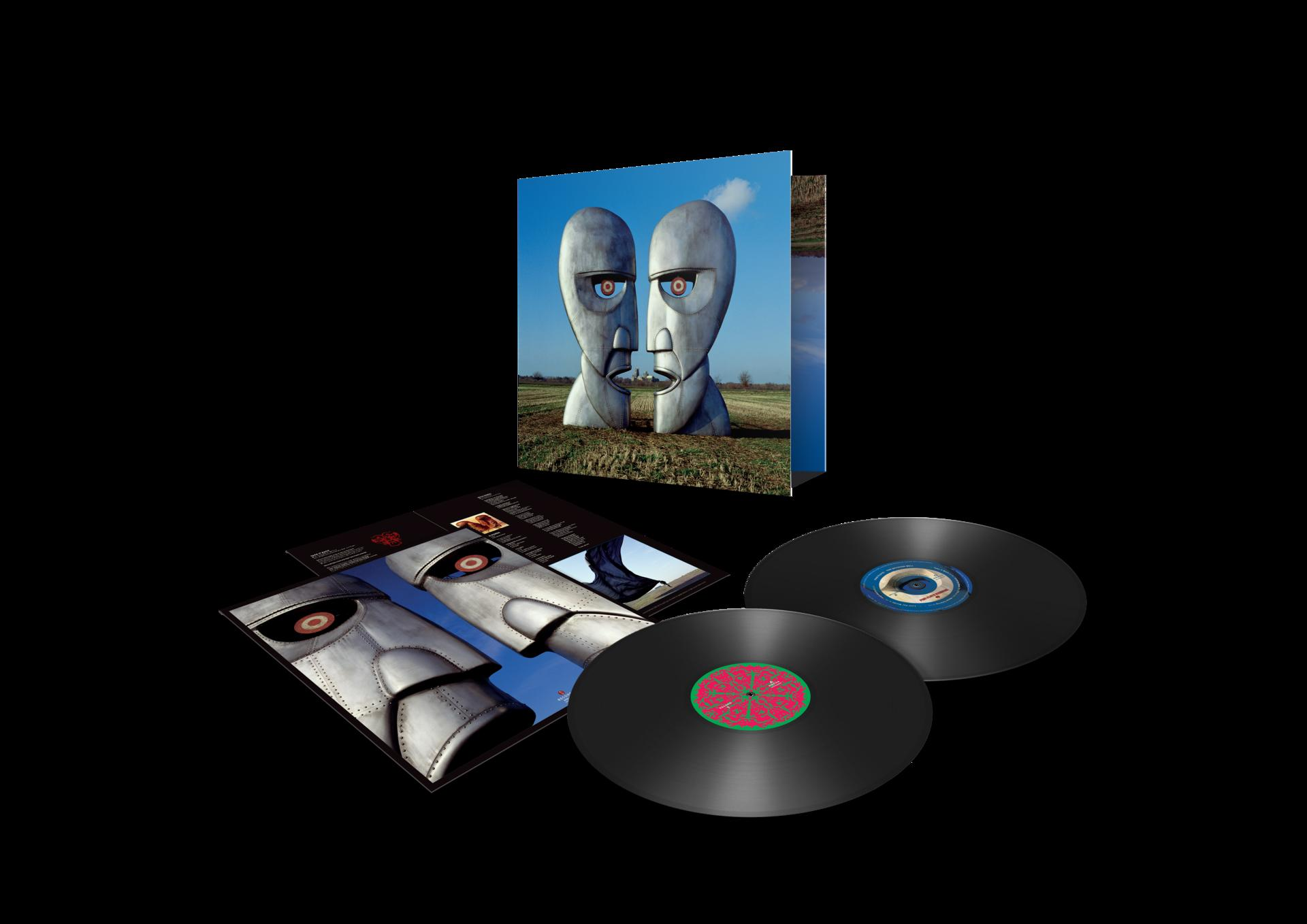 Pink Floyd Albumcover "Animals". Riesige Köpfe auf einem Feld, schwarze Schallplatten.
