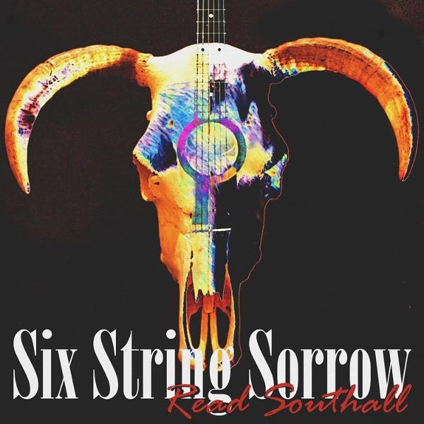 Albumkunst: ein Schädel mit einer Gitarre und dem Text 'Six String Sorrow Reed Southall'.