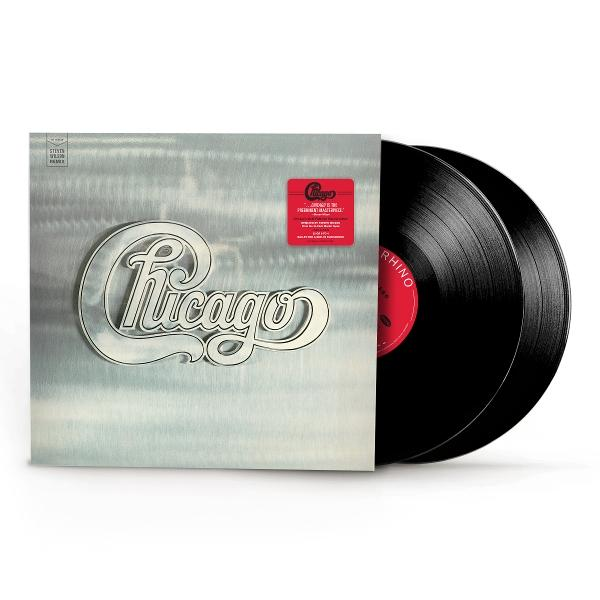 Albumcover des Chicago-Albums auf Vinyl. Zwei schwarze Schallplatten sind neben dem Albumcover sichtbar.