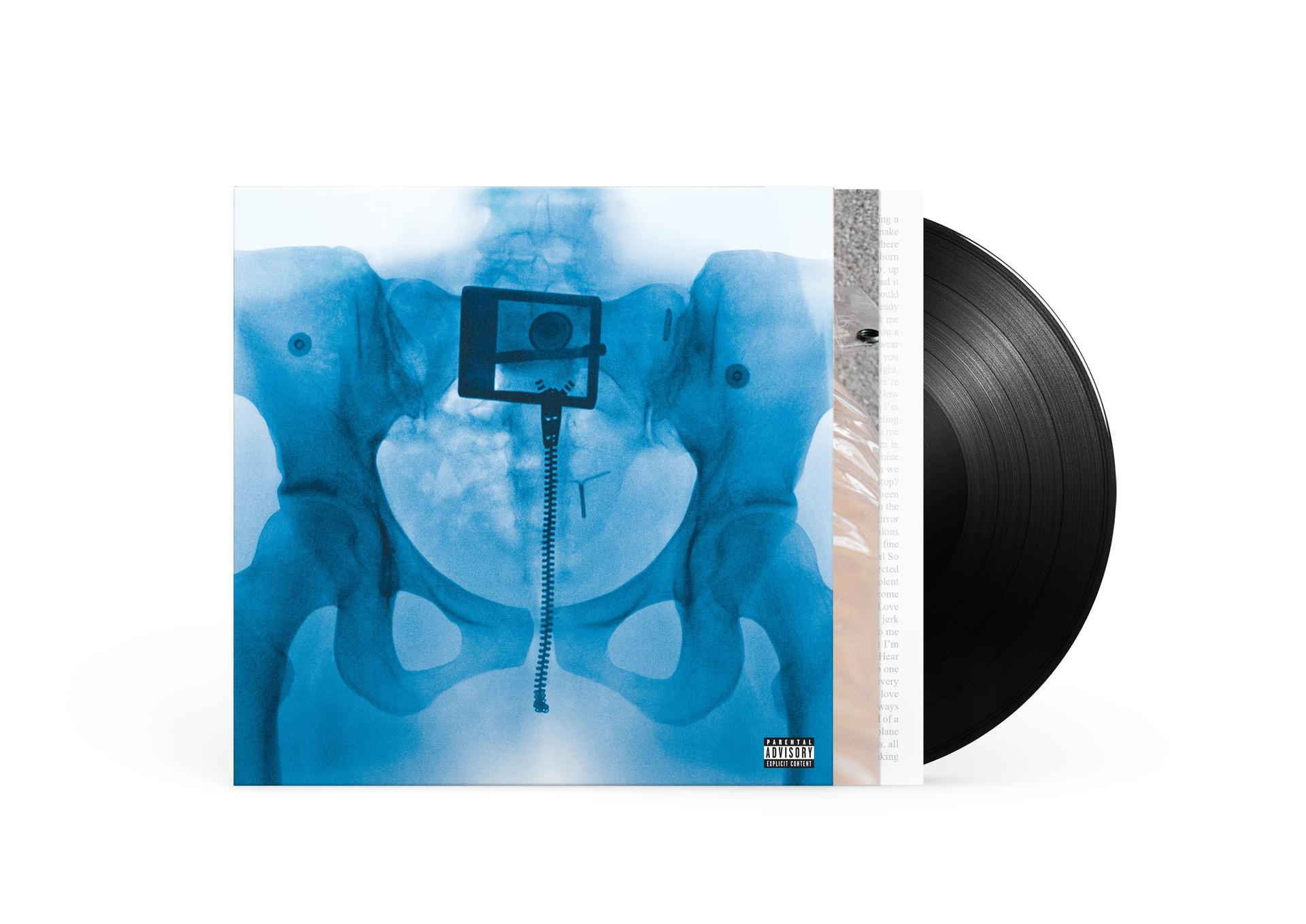 Albumcover mit Röntgenbild des Beckens. Eine Schallplatte befindet sich auf der rechten Seite.