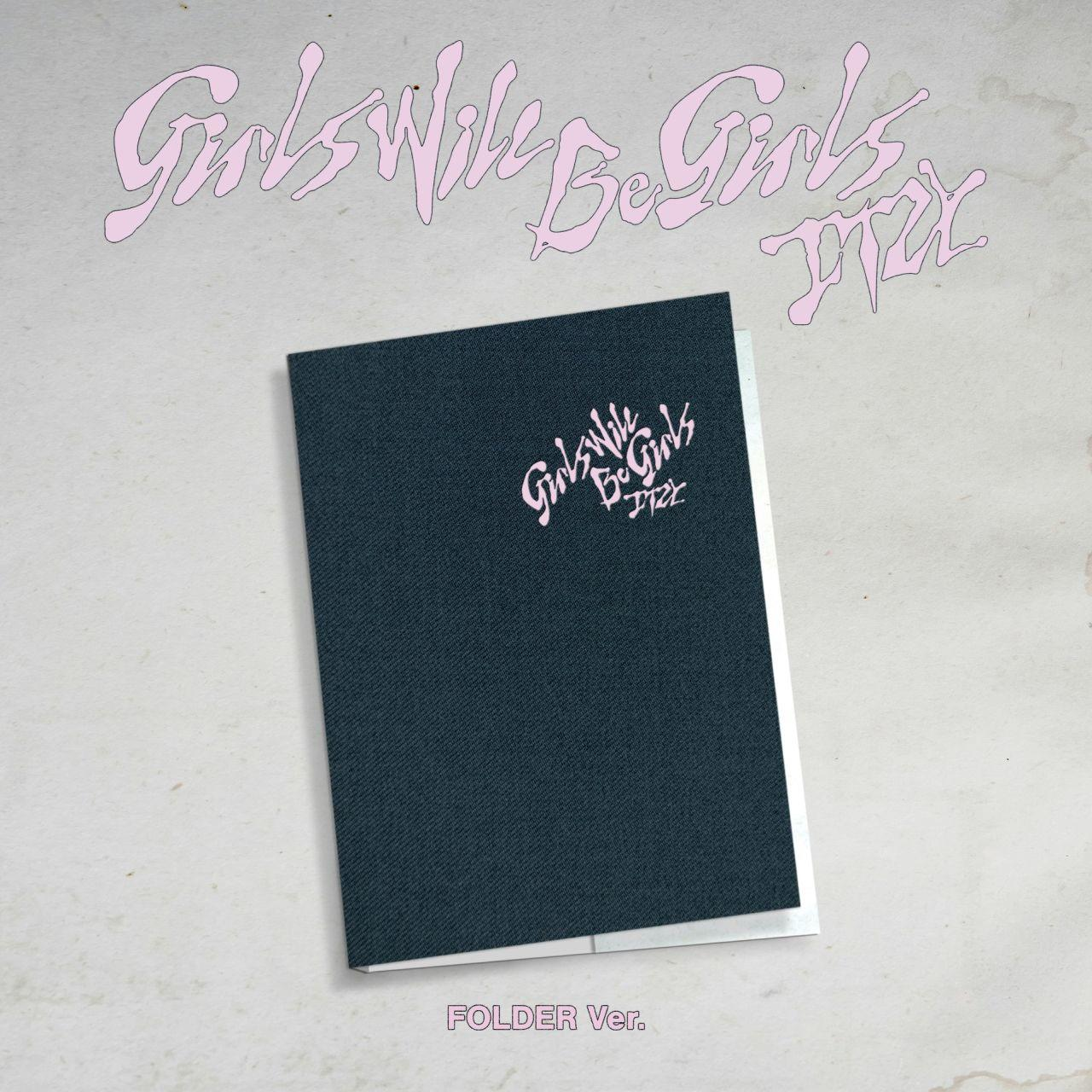 Eine Mappe mit Text: Girls will be Girls. Rosa Text auf grauer Oberfläche.