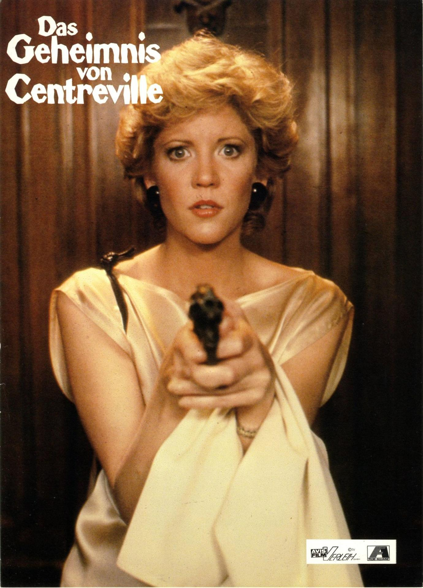 Filmposter mit einer Frau, die eine Waffe auf den Betrachter richtet. Der Titel auf Deutsch steht oben.