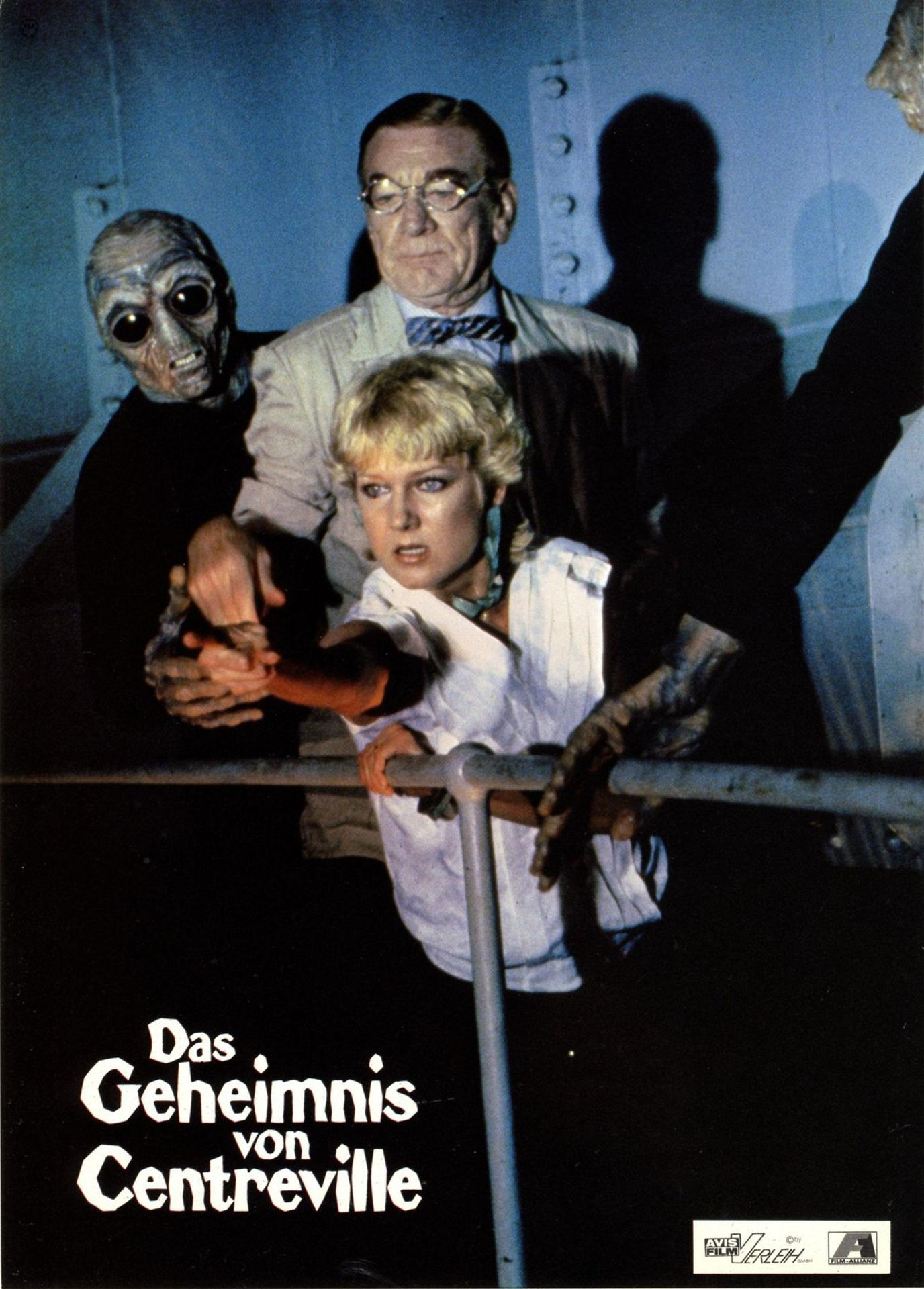 Filmposter: Eine Frau und ein Mann werden von zwei grauen Aliens gehalten. Titel: Das Geheimnis von Centreville.