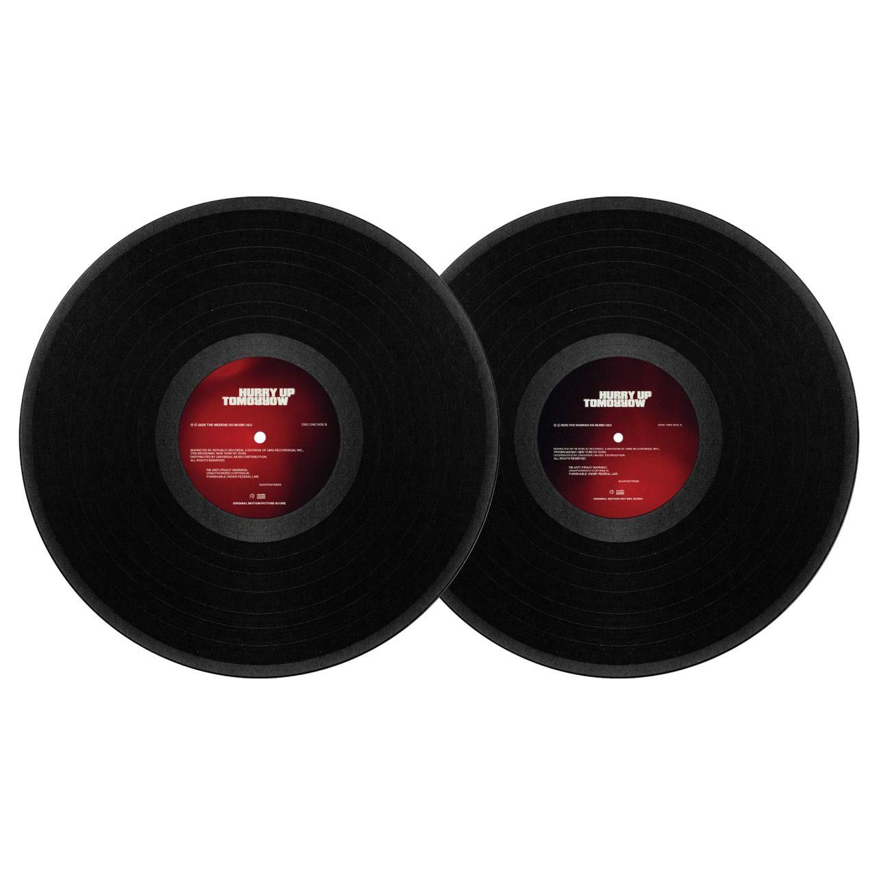 Zwei schwarze Schallplatten mit roten Etiketten.