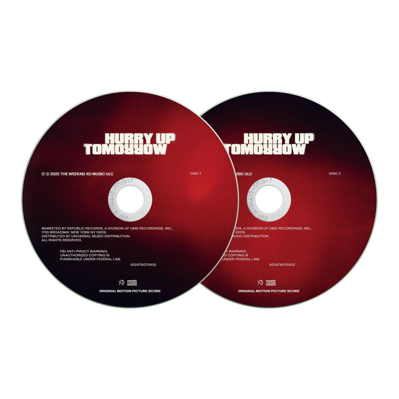 Zwei CDs mit roter Oberfläche, beschriftet mit 'Hurry Up Tomorrow', mit weißem Text.